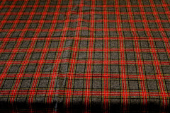 47″ X 60″ wide Grey/Red Woven Plaid Fabric