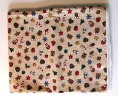 Multi-colored Small Figures on Light Tan Background Seasonal Print Fabric –