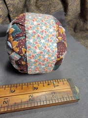 Handcrafted pieced fabric ball star pattern brown gold tones