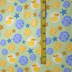 Yellow Rubber Ducks and Stars Green Flannel Fabric 45″ By The Yard