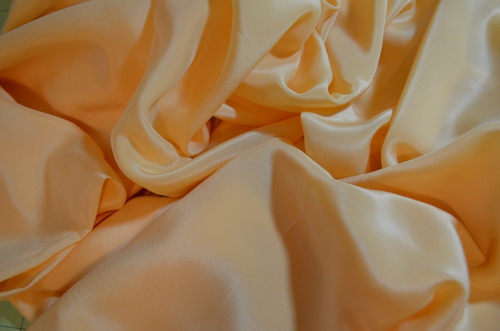 gold silky polyester, light weight 84″L x42″w (2.33 yds.)