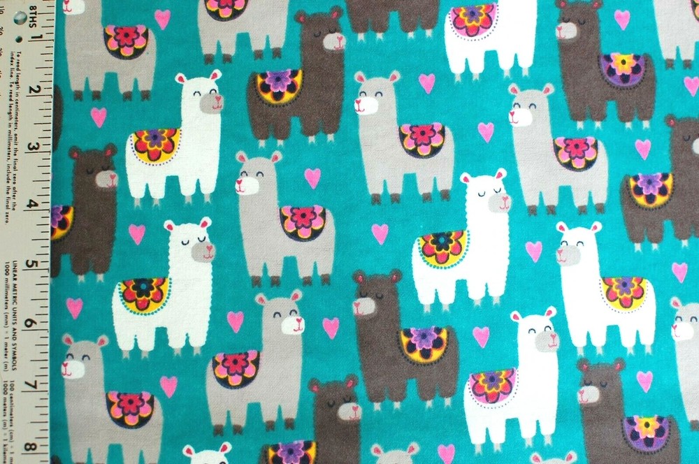 BTY*FACE MASK*WHITE/GREY LLAMAS WITH SADDLES ON TURQUOISE FLANNEL FABRIC 42X36″