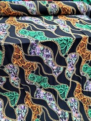 Snake print, Animal print, Jersey Knit Fabric. GREEN ORANGE STRETCH FABRIC Black