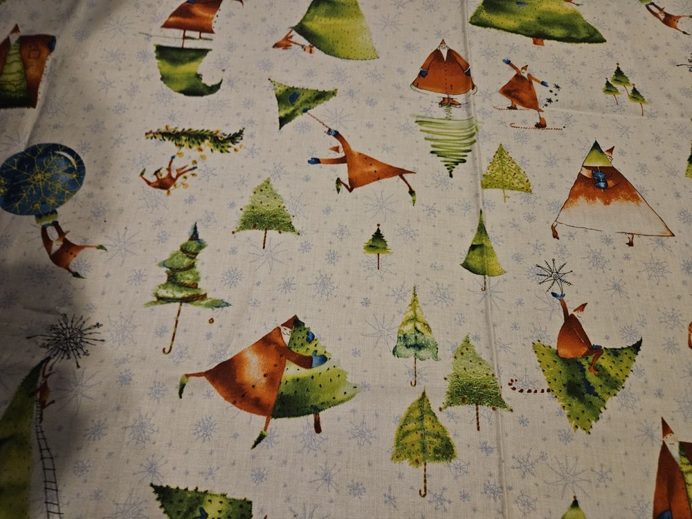 Clothworks “Santa’s Whimsy wintery scene with a pine tree and snowflakes 42 X 30