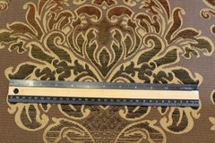 Damask medallion scroll upholstery material in taupe/brown/gold multi on taupe