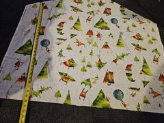 Clothworks “Santa’s Whimsy wintery scene with a pine tree and snowflakes 42 X 30