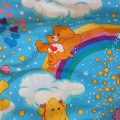 Care Bears Cartoon Print Fabric Blue Rainbow Clouds 44″ W x 89″ L NWOT Vintage