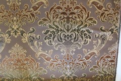 Damask medallion scroll upholstery material in taupe/brown/gold multi on taupe