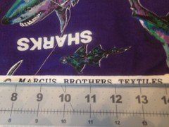3/4 YD X 60″ COLORFUL SHARK’S ON NAVY BACKGROUND, by MARCUS BROS. # 4726