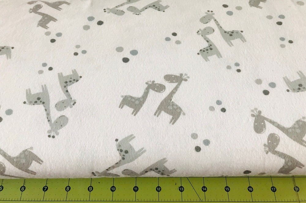 Giraffe Pair On White Flannel fabric sold by the yard #2754