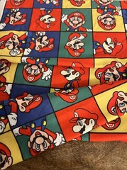 Super Mario Bros Multicolored Cotton Material 60”L – 19” W Material Code 480410