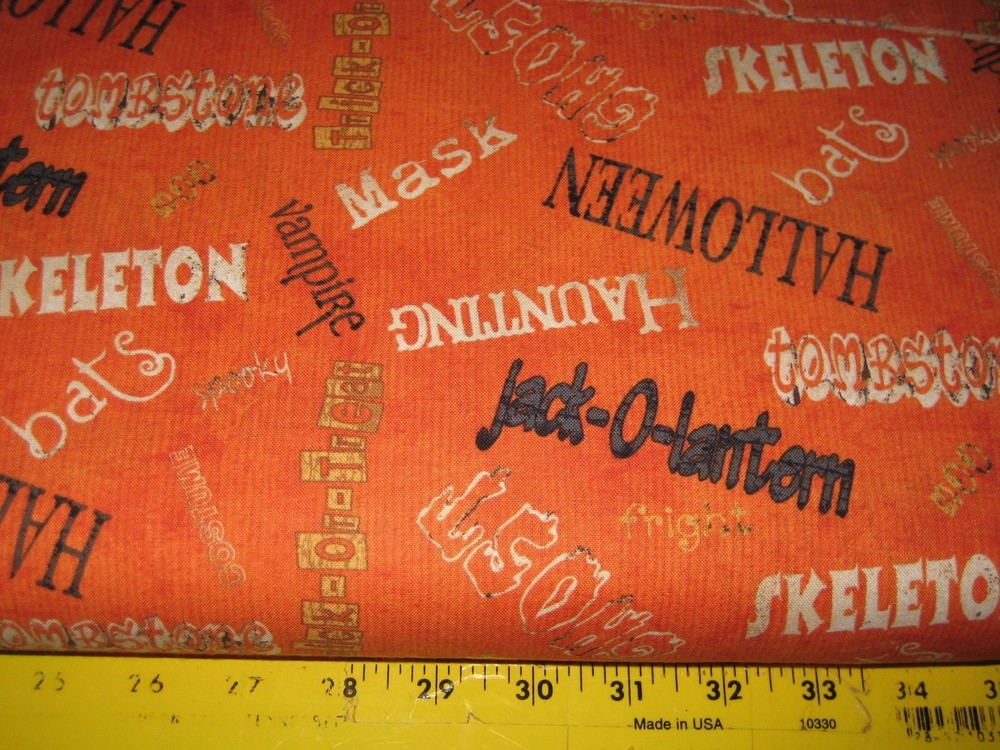 PRIMITIVE 100% HALLOWEEN SPOOKY SPECTACULAR WORDS ON ORANGE COTTON FABRIC 45″