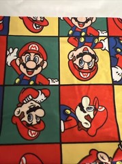 Super Mario Bros Multicolored Cotton Material 60”L – 19” W Material Code 480410