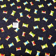 Quilters: Spools of Thread Tossed on Charcoal, Cotton Fabric by Henry Glass