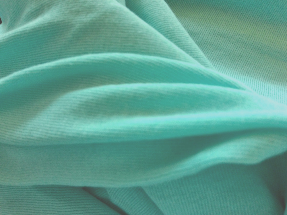 CAPRI GREEN 2 WAY STRETCH POLYESTER BLEND KNIT FABRIC BY THE YARD