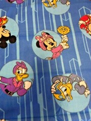 MICKEY AND FRIENDS BADGE TOSS FLEECE BY THE YARD