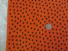 5143. Jo-Ann BLACK STARS on ORANGE Craft, Quilting COTTON FABRIC-42″ x 3 yds.