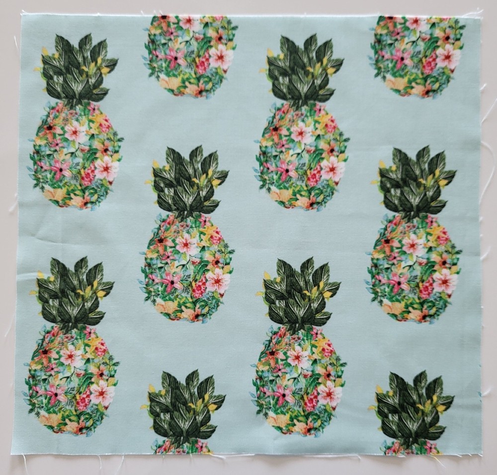 Fabric Cotton Pic A – Flowers Pineapples on Lt Green- 11 1/4″ L x 11 3/4″ W
