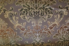 Damask medallion scroll upholstery material in taupe/brown/gold multi on taupe