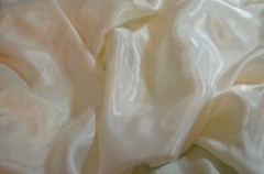cream polyester jacquard fabric, circles 90 L” x 44″ W (2.5 yds)