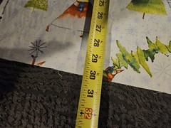Clothworks “Santa’s Whimsy wintery scene with a pine tree and snowflakes 42 X 30