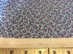 LAVENDER & WHITE MINI FLOWERS ON BLUE POLY-KNIT-60 INCH WIDE- 1 3/8 YARDS