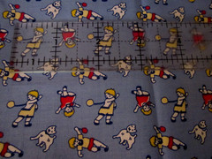 F7455, 1930’s reproductions, blue with children playing, no name on selvedge,