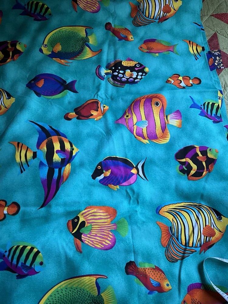 Turquoise Larger Fish Print Cotton Fabric 45” wide. Suitable for quilting.