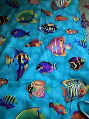 Turquoise Larger Fish Print Cotton Fabric 45” wide. Suitable for quilting.