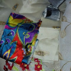 Lot Of embroidered embellishment remnants and fabrics pieces
