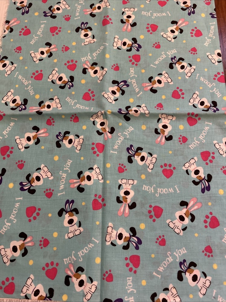 I WOOF YOU DOG & PAW PRINTS ON TURQUOISE 100% COTTON FABRIC 44X30″