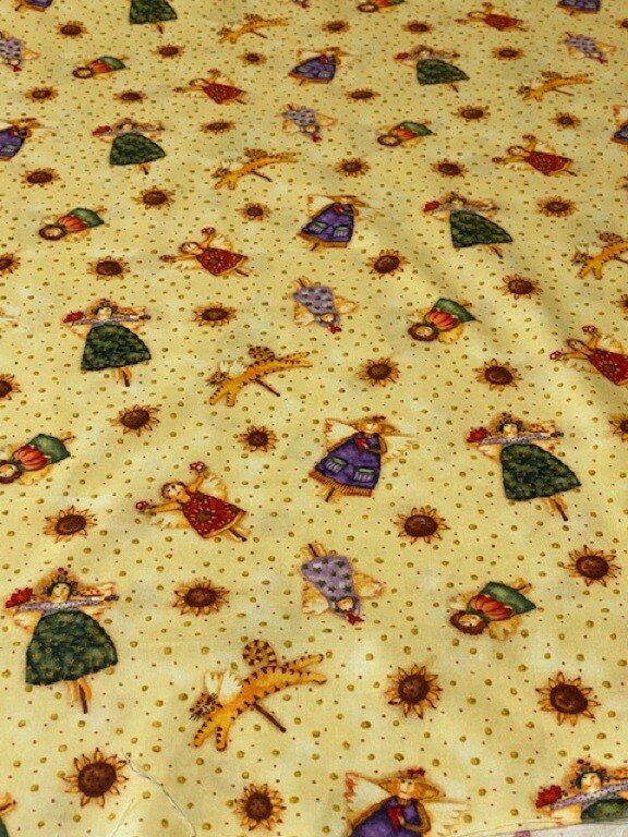 Pretty Harvest Angels on Golden Yellow cotton Fabric per yd 44″