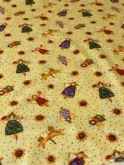 Pretty Harvest Angels on Golden Yellow cotton Fabric per yd 44″