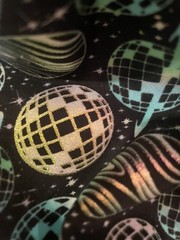 Holographic Disco Planets Cotton Knit Fabric 57” Wide by Pop! 6yd Cont Piece