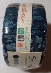 Snowbird jellyroll. By Laundry Basket for Moda Fabric. In plastic
