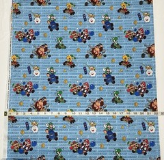 NEW cotton fabric half yard – Mario Kart Action – Characters on Blue Background