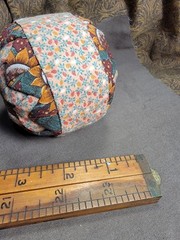 Handcrafted pieced fabric ball star pattern brown gold tones