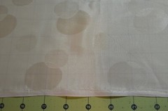cream polyester jacquard fabric, circles 90 L” x 44″ W (2.5 yds)