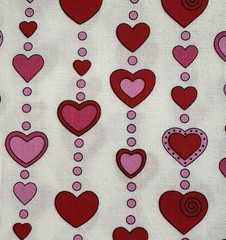 “Love Me Do” Red and Pink Beaded Hearts on White Valentine Fabric