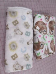 Fleece Fabric – Sloths on Cream 33″ x 51″ and Animals/ABC on Cream 26″ x 62″