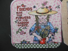 8 fabric pieces, Mary Engelbreit prints: 6.5″ x 6.5″