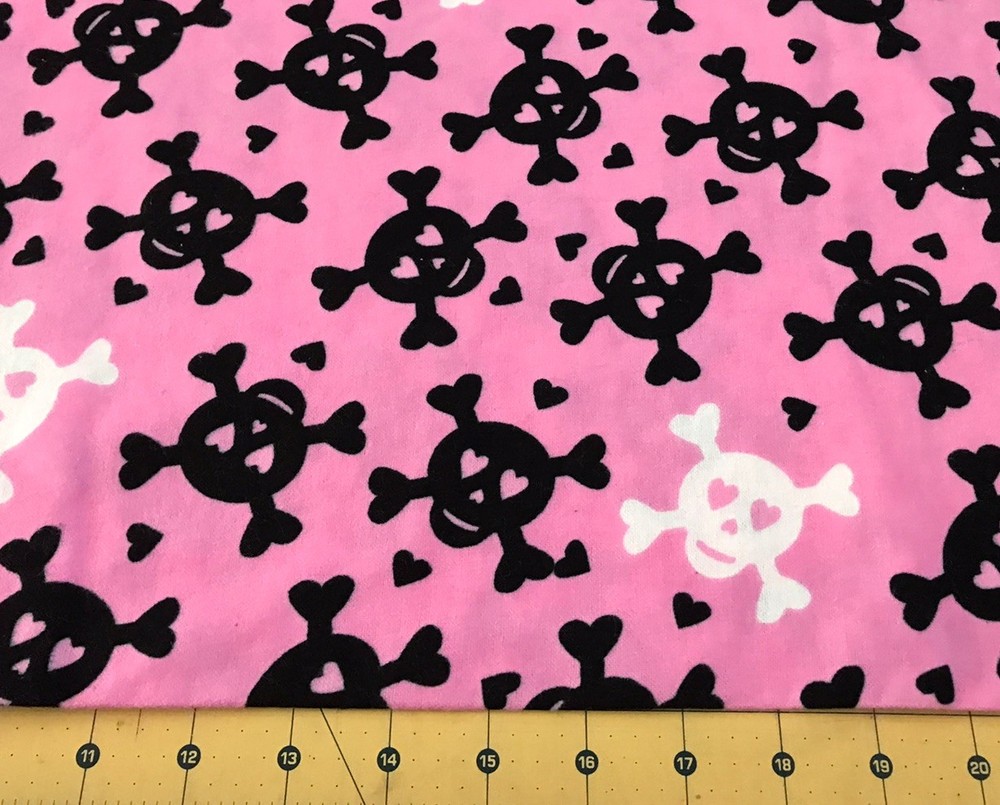 Skulls and Hearts on Pink Flannel fabric sold by the yard #2182