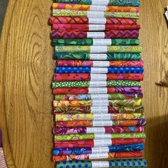 25 Kaffe Fassett Collective Fat Quarters In Cigar Rolls.