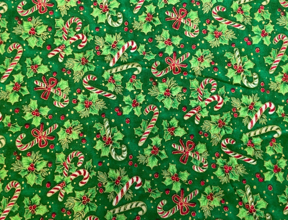 FABRI-QUILT-SEASON’S GREETINGS #930 CANDY CANES & HOLLY ON GREEN COTTON- 1 1/8YD