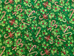FABRI-QUILT-SEASON’S GREETINGS #930 CANDY CANES & HOLLY ON GREEN COTTON- 1 1/8YD