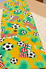 Soccer Balls* USA*on Green & Yellow * Stutz-Horowitz Co.* 100% Cotton* 8″ x 29″