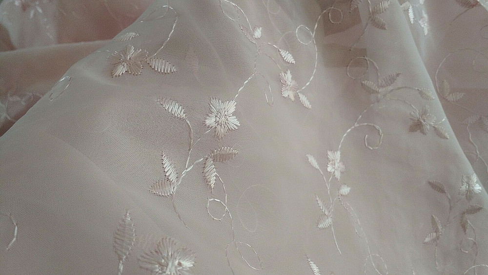 Discount embroidered pink Voile 110″ wide by yard. Semi sheer. Free swatches.