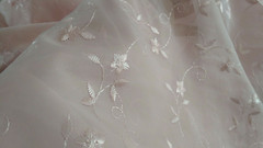Discount embroidered pink Voile 110″ wide by yard. Semi sheer. Free swatches.