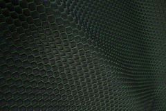 Hexagon Vinyl Grain Quilted Faux Leather Upholstery Fabric | Purple Green 55″
