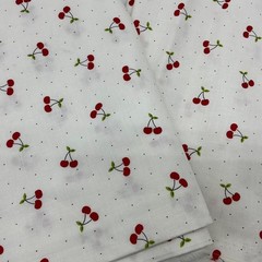 Red Cherries with Green Leaves on White with small Polka Dots Background